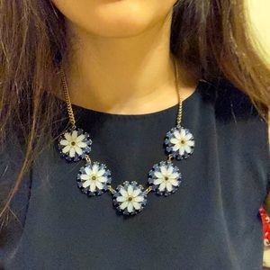 Francesca’s blue floral statement necklace